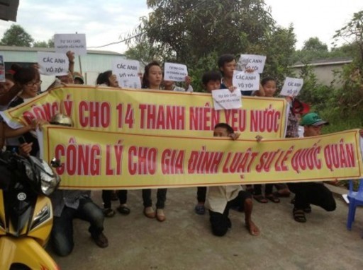 Family members and supporters rally to demand freedom for human rights defenders on May 23, 2013 in Vinh City, Nghe An, Vietnam.