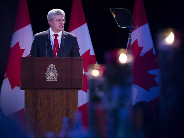 Prime Minister Stephen Harper addresses a fund raiser for a memorial to the victims of Communism in Toronto, Ont. on Friday, May 30, 2014.