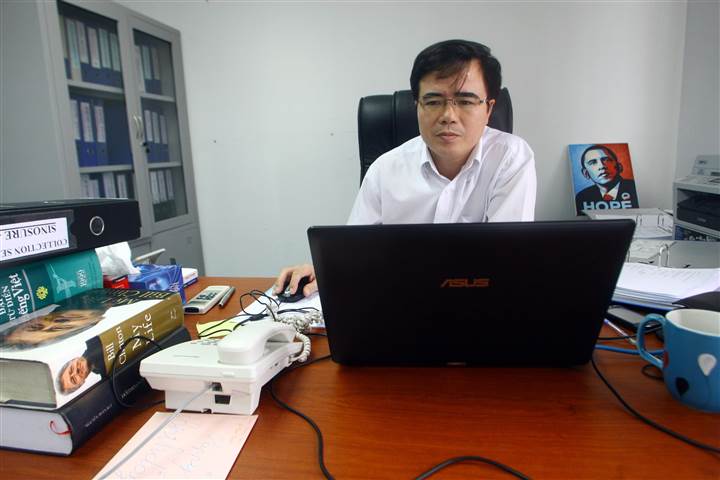 Le Quoc Quan, one of Vietnam's better-known dissidents and a leading blogger, works at his office in Hanoi, Vietnam.