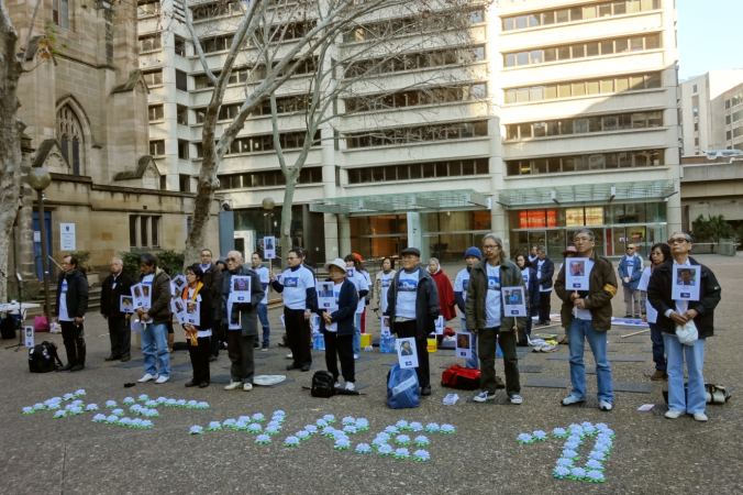 Hunger strikers gathered on the side of Sydney’s Town Hall on July 25, 2015 to peacefully protest human rights violations in Vietnam and demand the Vietnamese regime to release all its prisoners of conscience. (Mimi Nguyen Ly/Epoch Times)