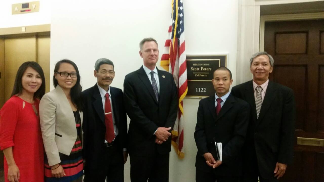 Mr. Tam (second from right) and other Vietnamese activists at a reception given by U.S. Congressman Scott Peters in Washington in June 2015
