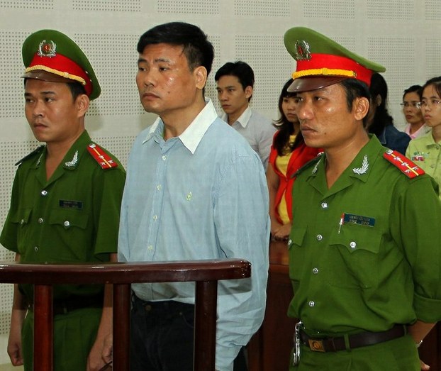 Truong Duy Nhat stands trial at a local People's Court in Danang, March 4, 2014.