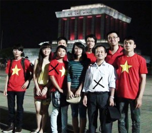 Tran Nhat Quang (white shirt) and other pro-government activists in Hanoi