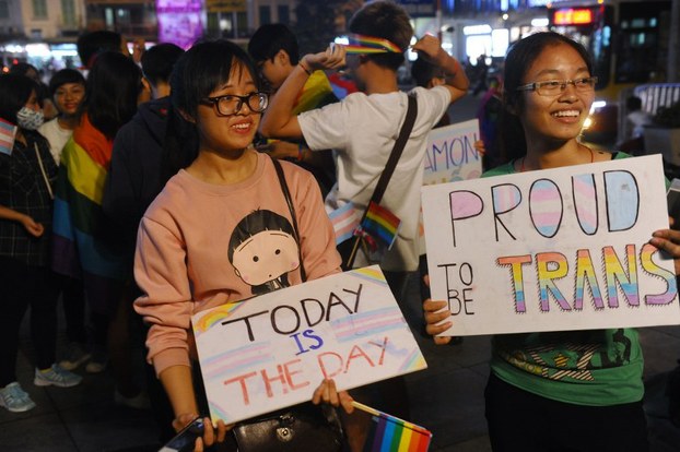 Members of the local lesbian, gay, bisexual and transgender (LGBT) community gather to celebrate a law on transgenders in Hanoi, Nov. 24, 2015.