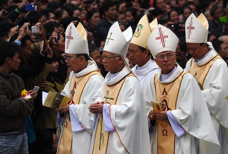 Vietnamese Catholic dignitaries march in a procession for a Mass on the occasion of a pastoral visit by Cardinal Fernando Filoni, prefect of the Congregation for the Evangelization of Peoples, in Hanoi, Jan. 20. (Photo: AFP)