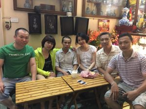 Activist Truong Minh Tam (third from left) surrounded by other activists several hours after being released