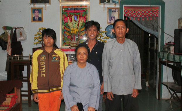 Hoa Hao follower Vo Van Buu (R) and his family are shown in an undated photo. Photo courtesy of truyenthongpghh